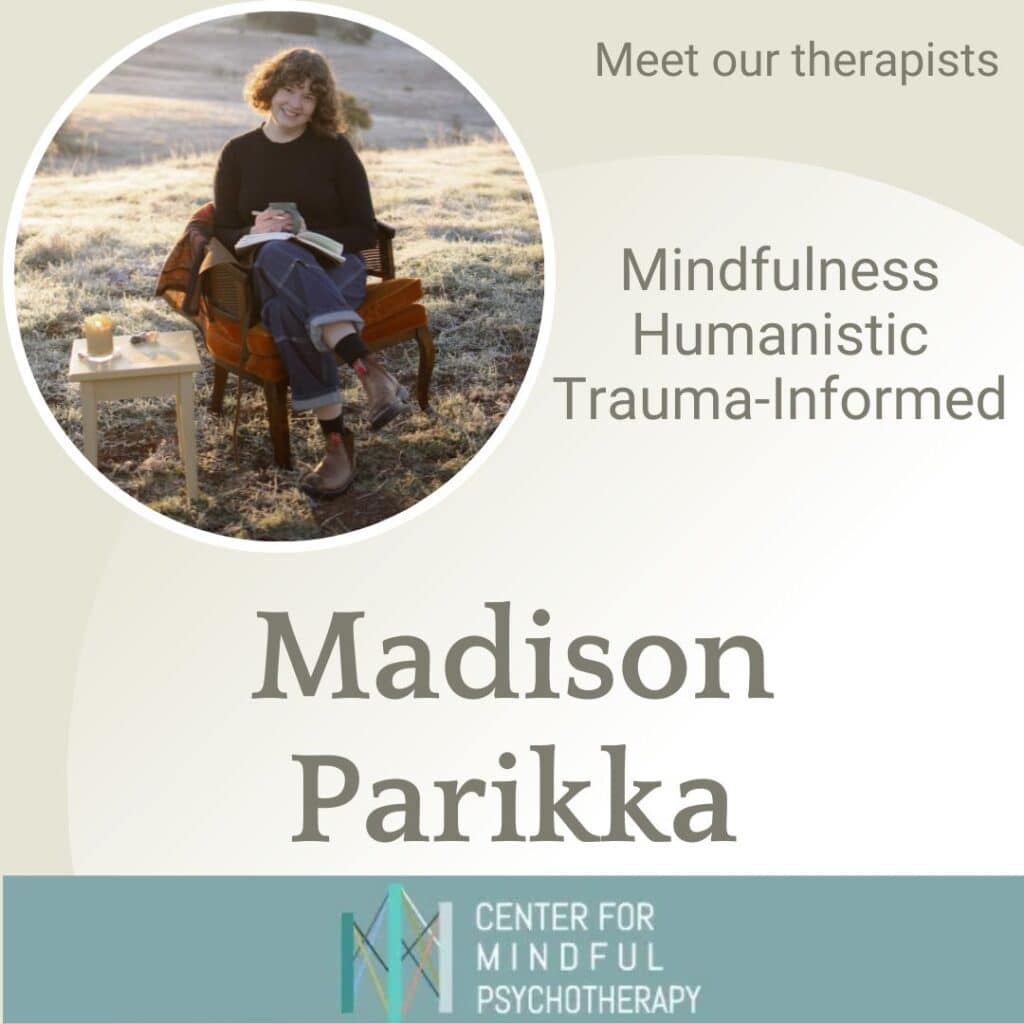 Madison Parikka, AMFT, sitting outdoors in nature journaling - specializing in mindfulness, humanistic, and trauma-informed therapy at Center for Mindful Psychotherapy
