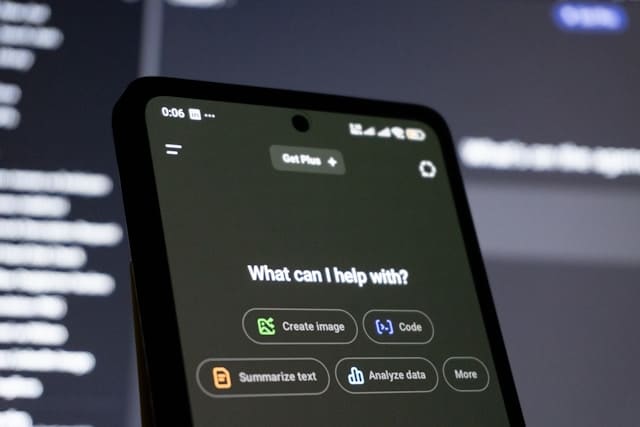 Smartphone showing AI chatbot interface representing mental health app limitations compared to real therapy